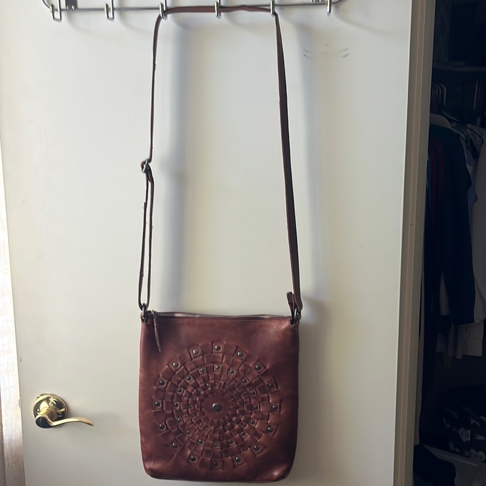 Leather adjustable cross body bag. Great quality.
